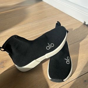 Alo sock sneakers , black with white edges, extremely comfy and fitting